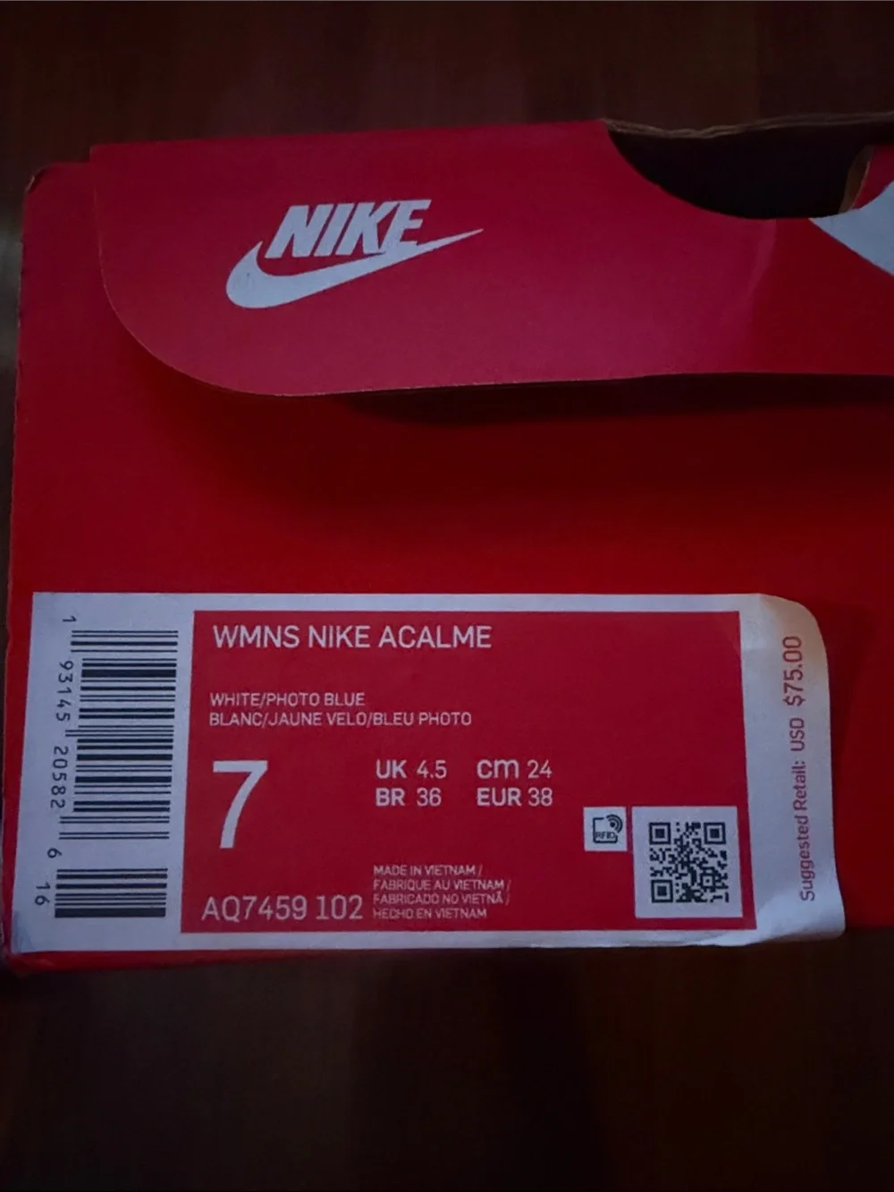 Nike White Athletic Sneakers with Blue Swoosh and Cream Trim